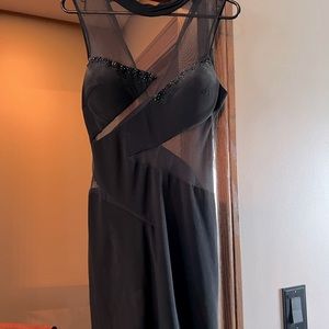 Sexy black homecoming dress with black diamonds on it